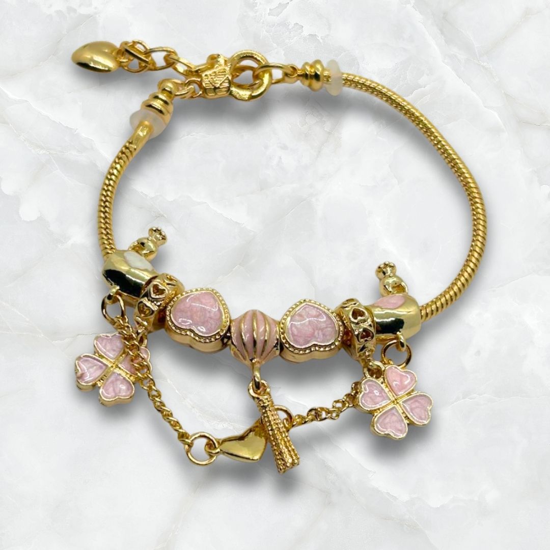 Pulsera Color Dorado con Rosa y Treboles
